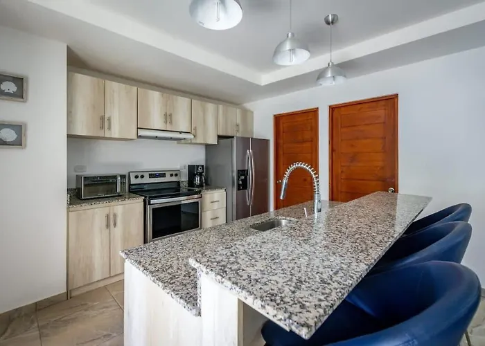 Ultramodern Townhome With An Inviting Coastal Design And Lush Outdoor Oasis With A Private Pool