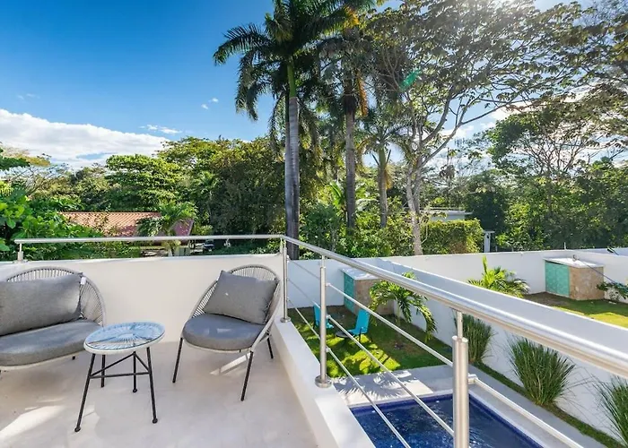Ultramodern Townhome With An Inviting Coastal Design And Lush Outdoor Oasis With A Private Pool