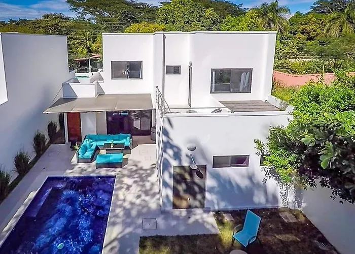 Ultramodern Townhome With An Inviting Coastal Design And Lush Outdoor Oasis With A Private Pool
