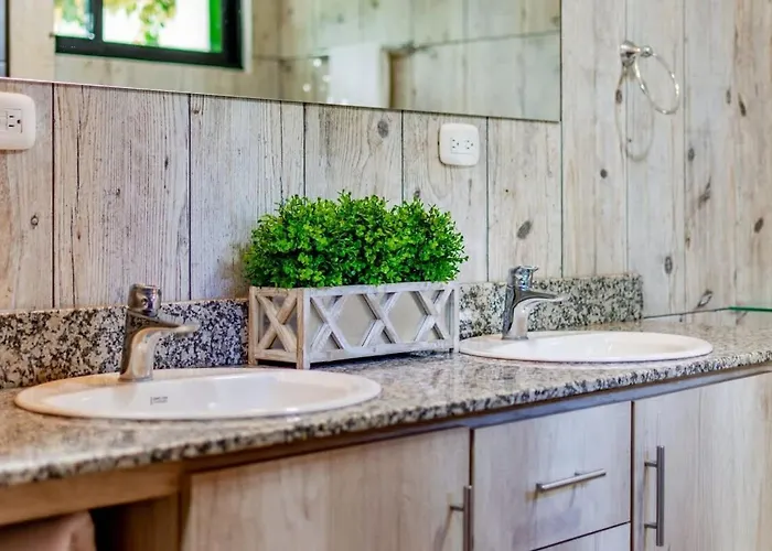 Holiday home Ultramodern Townhome With An Inviting Coastal Design And Lush Outdoor Oasis With A Private Pool
