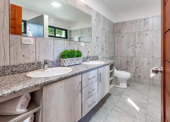 Ultramodern Townhome With An Inviting Coastal Design And Lush Outdoor Oasis With A Private Pool *