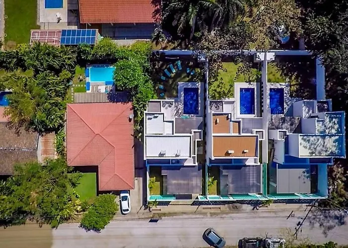 Ultramodern Townhome With An Inviting Coastal Design And Lush Outdoor Oasis With A Private Pool